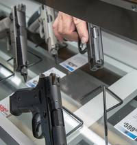 Présentoir arme de poing universel