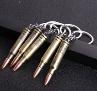 Porte clé balle 300 win mag en métal avec inscriptions